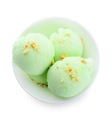 Bowl with delicious pistachio ice cream on white background