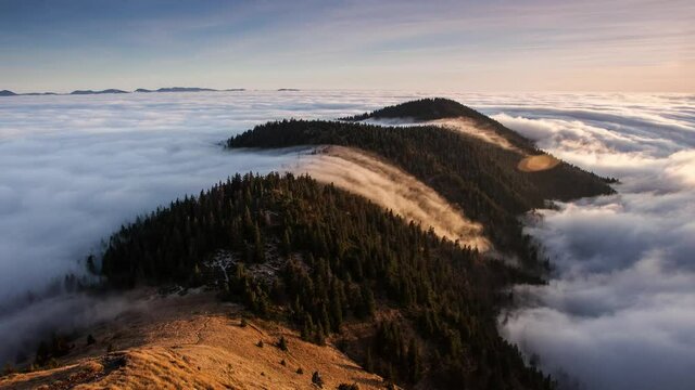 Time lapse, Above clouds in fall - mountain landcape at sunset, Slovakia