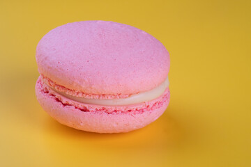 Close-Up Of Cookie Macoron on yellow background with copy space.