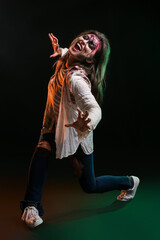 Scary zombie woman on dark background