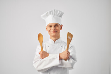 Cheerful male chef kitchenware work staff restaurants