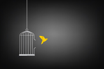 Flying bird and cage. Freedom concept. Emotion of freedom and happiness. Minimalist style.  © madedee