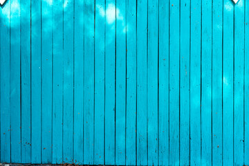 Blue wood textured background. Wooden wall or fence with zigzag planks. Seamless herringbone pattern. High quality photo