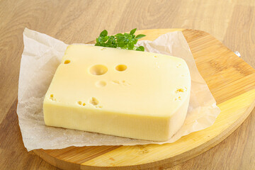Maasdam cheese over the board