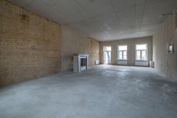 empty loft room with brick wall and repair and without furniture for office