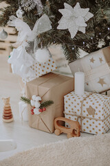 Christmas tree with gift boxes. New Year's decorations. New Year's interior.