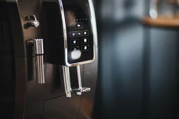 Fototapeten Machine a café en marche, la machine et neuve et brille  © lamurebenjamin
