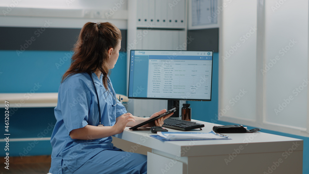 Poster medical assistant working with computer and digital tablet for healthcare system and appointments. w
