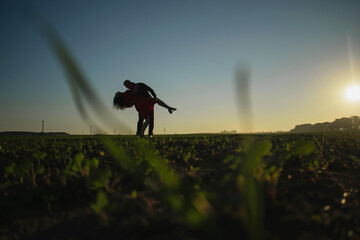 silhouette of lovers at sunset