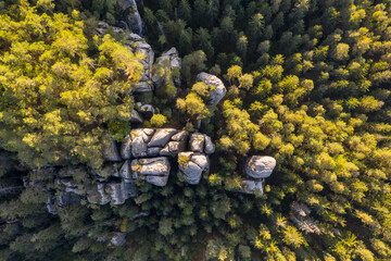 Adrspach rocks at sunset. Aerial top down view of trail path in rock formations, cliffs and trees...