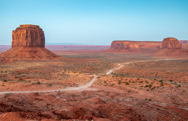 Amazing landscape of Monument Valley on a sunny summer sunset