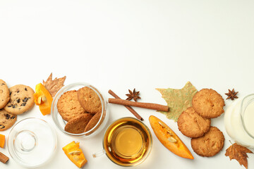 Obraz na płótnie Canvas Concept of tasty food with pumpkin cookies on white background