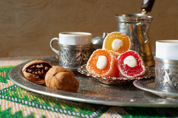 Turkish Coffee served with Turkish Delight on metal tray