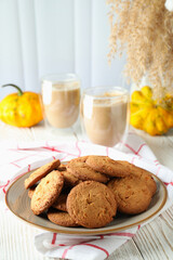 Concept of tasty food with pumpkin cookies