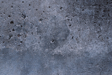 Top view of Black, white, gray grunge textured rough stone background with cracks, scratches and stains or creative concrete backdrop. 
