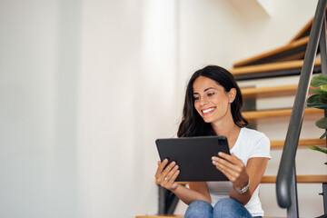 Fototapeta premium Adult woman, browsing the internet.