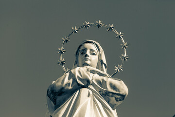 Sculpture of the Mother of God with a golden halo and stars on her head