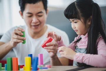 father and mother with children in concept of family relationship together, happy daughter woman with love and happy life at home