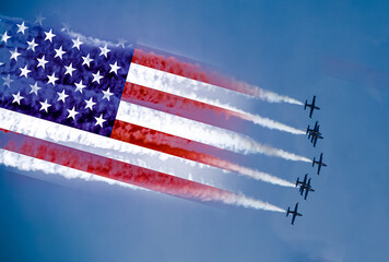USA air forces strike concept. Fighter aircrafts with American flag contrail - Powered by Adobe