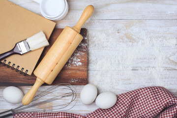 Homemade flour mixture on a wooden table, viewed from above.