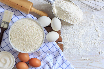 Homemade flour mixture on a wooden table, viewed from above.