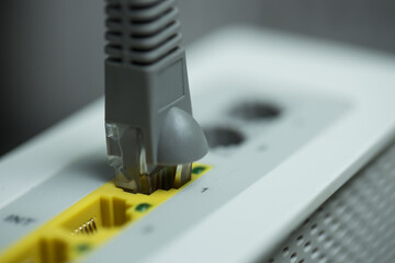 a modern router with a network cable