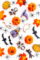 Halloween party background flat lay with gingerbread cookies