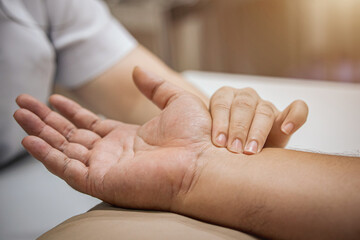 Check pulse, doctor's hand checks the patient's pulse with traditional Chinese medicine. health...