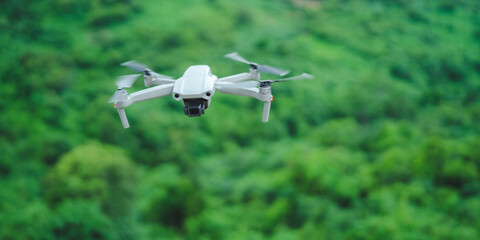hight technology of helicopter drone for take a photo in aerial top view, flying on sky by remote control, professional aircraft robot innovation