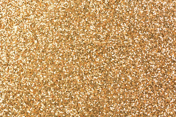 Bronze glitter texture background, glitter or sandpapper high detailed surface, shining glowing...