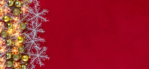 Christmas decoration on red background.