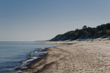 SEA COAST - Pebble stones on the shoreline