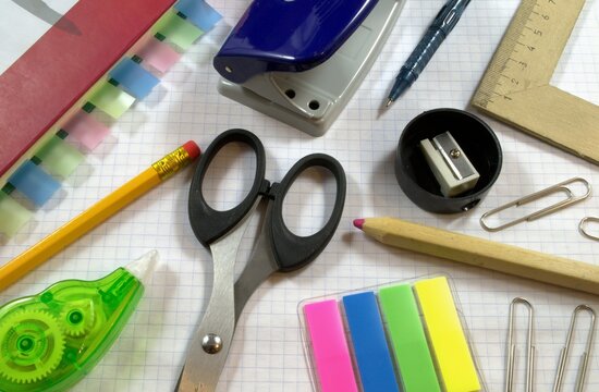 Stationery is laid out on a sheet incircle a cage