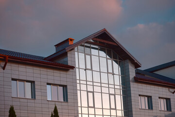 Element of modern house with large panoramic windows. House with large glazed windows. Glazed...