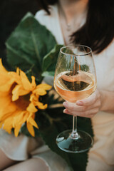a glass of wine in your hand