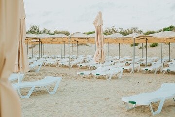 sun loungers on the seashore . place of rest