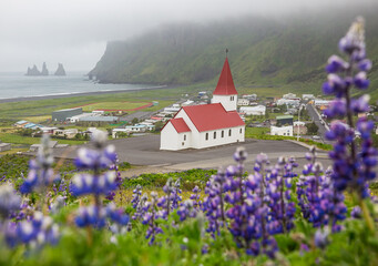 white church on the hill in Vik Iceland 