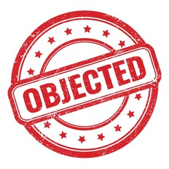 OBJECTED text on red grungy vintage round stamp.