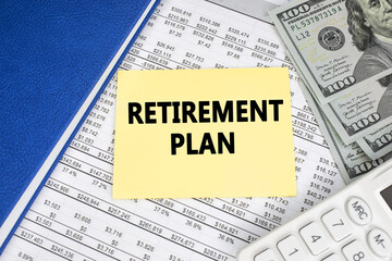 The pension plan is written on a yellow sheet that lies on a financial document near a white calculator and notepad. The concept of the future