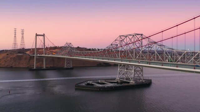Aerial: Freeway traffic on the  Alfred Zampa Memorial Bridge and Carquinez Bridge between Oakland and Vallejo. California, USA