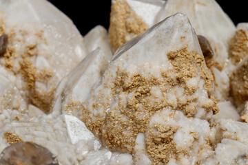 Macro mineral stone Snow quartz with calcite on a black background