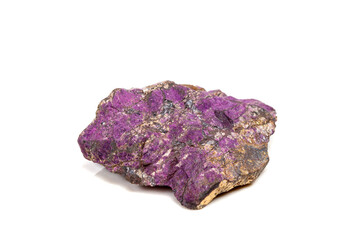 Fototapeta premium Macro mineral stone purpureus, (purple) purpurite in the breed a white background