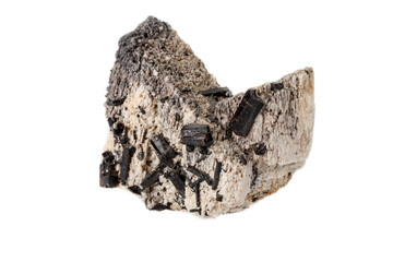 Macro mineral stone Schorl, Black Tourmaline on the feldspar on a white background