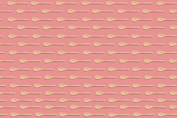 Seamless image of a spoon on colored pastel background