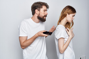 married couple family with phones in hand communication isolated background