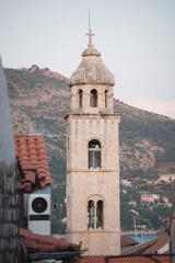 Dubrovnik Clock Tower or Bell Tower in Luza Square. It's also known as Susak Bell Tower built in the 14th century. Travel to Dubrovnik, Hrvatska, where most people visit the old town in Croatia - obrazy, fototapety, plakaty