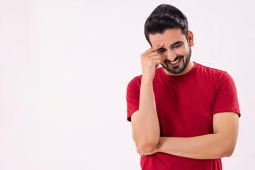 Fototapeta premium A HAPPY MAN LAUGHING AND LOOKING DOWN