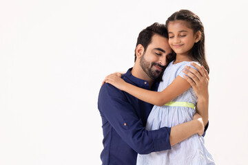 Naklejka premium A HAPPY FATHER AND DAUGHTER LOVINGLY EMBRACING EACH OTHER