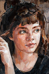 Portrait of a brunette girl. The background is dark blue. Oil painting on canvas.