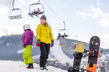 Family winter vacation in ski resort